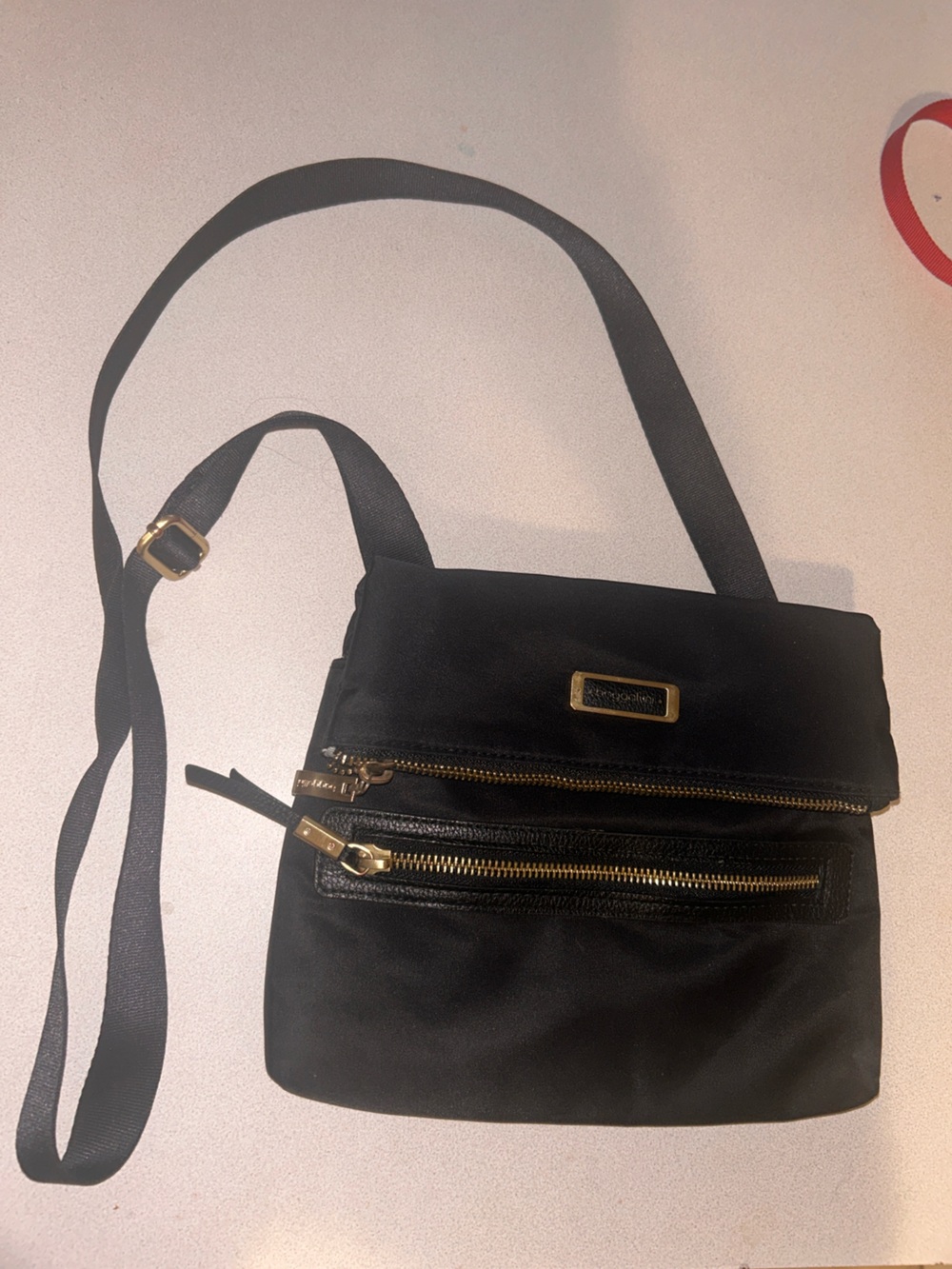 Baggalini Black Crossbody Bag with Gold Hardware